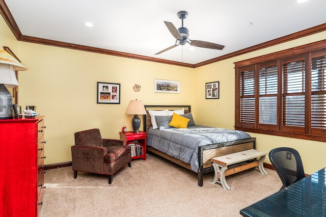 carpeted bedroom featuring ceiling fan and ornamental molding