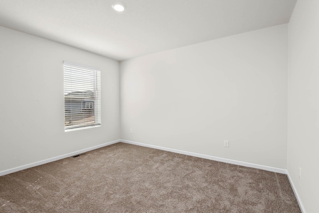 view of carpeted spare room