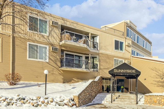 view of snow covered property