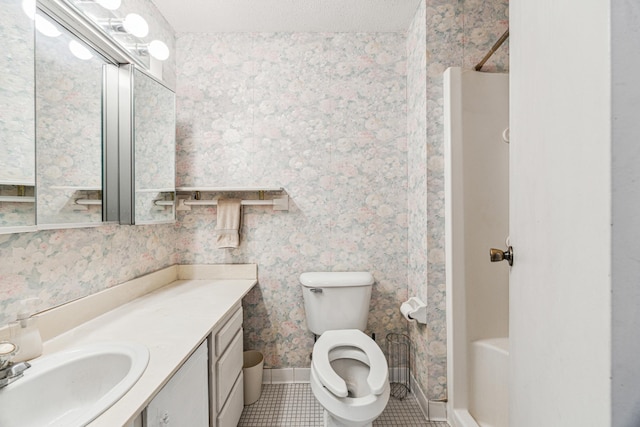 bathroom with vanity, tile patterned floors, a shower, and toilet