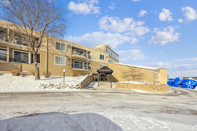 view of snow covered property