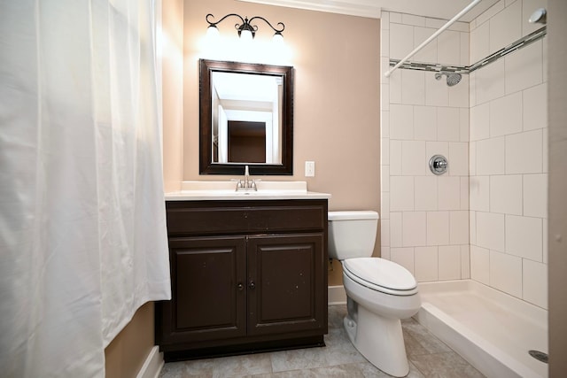 bathroom with vanity, curtained shower, and toilet