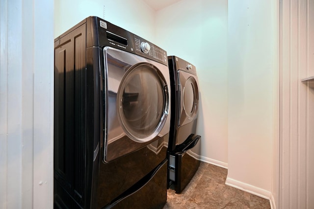 laundry room with washer and dryer