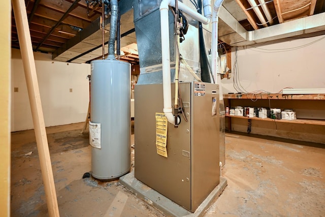 utility room with heating unit and gas water heater