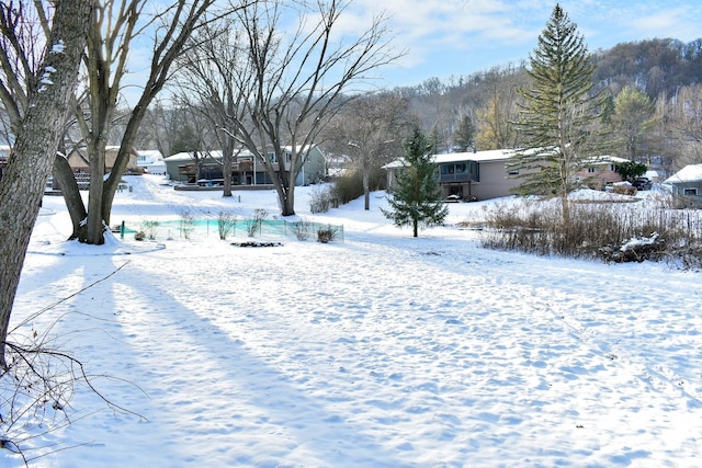 view of snowy yard