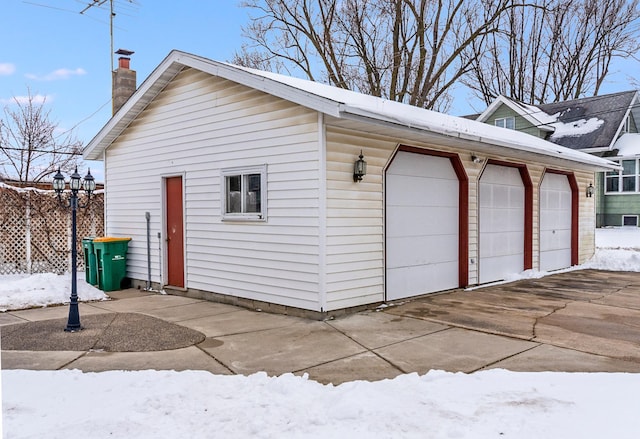 view of snow covered garage