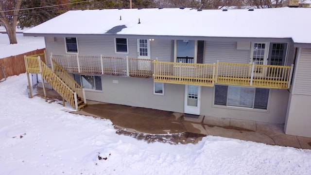 view of snow covered property