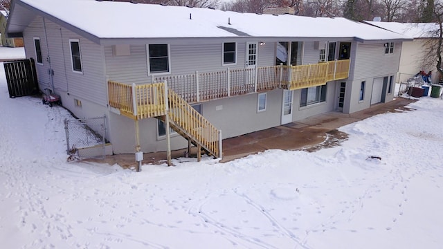 view of snow covered house