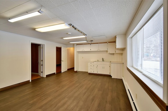 interior space with sink and dark hardwood / wood-style floors