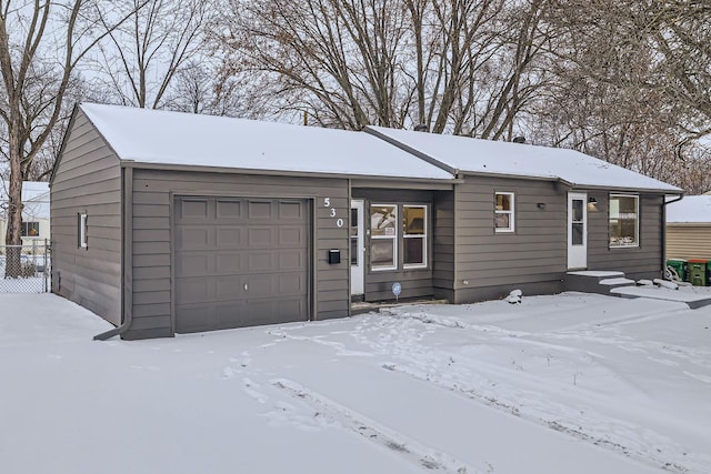 single story home with a garage