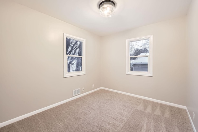 view of carpeted spare room