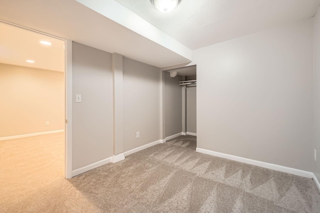 basement featuring carpet floors