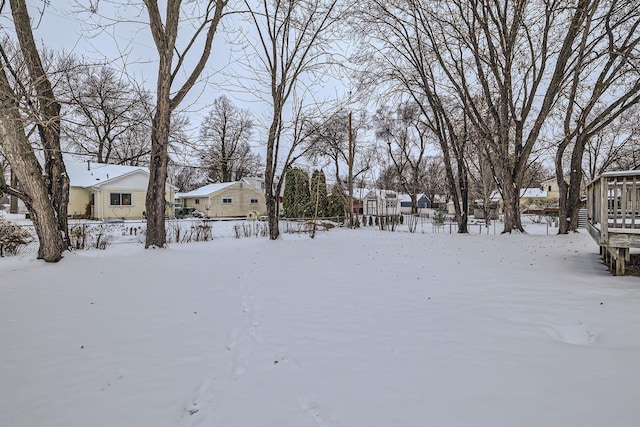 view of yard covered in snow