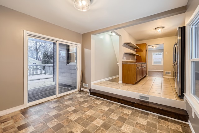 kitchen with stainless steel fridge