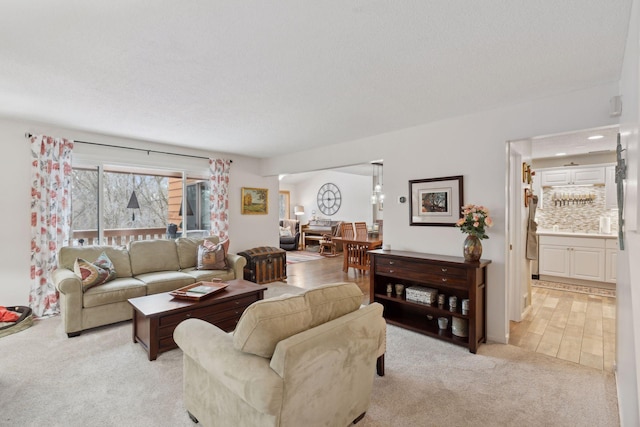 living room with light colored carpet