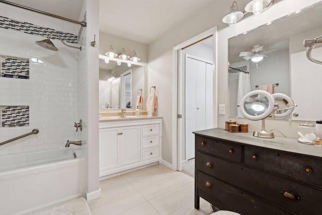 bathroom with ceiling fan, vanity, shower / bath combination with curtain, and tile patterned flooring