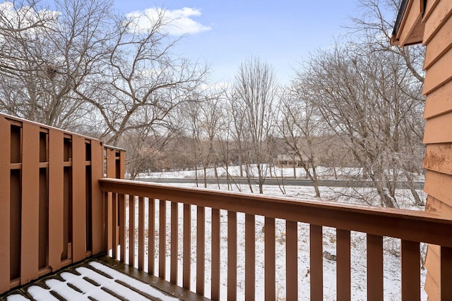 view of snow covered deck