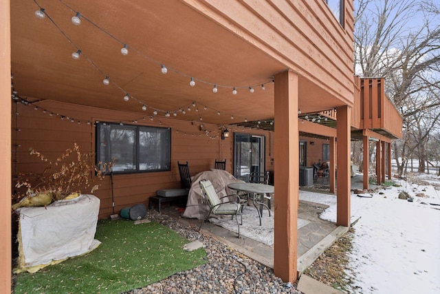 view of snow covered patio