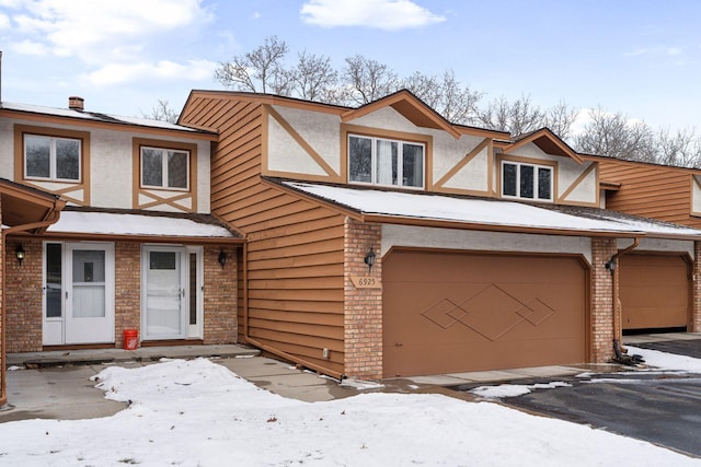 tudor home with a garage