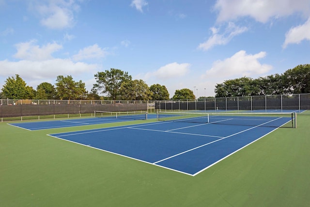 view of sport court featuring basketball hoop