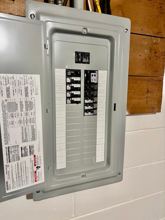 utility room featuring electric panel