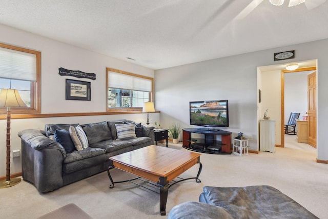 living room featuring light carpet