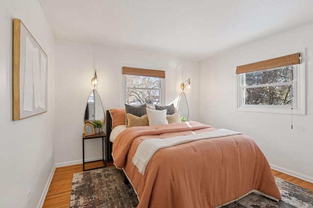 bedroom featuring wood-type flooring