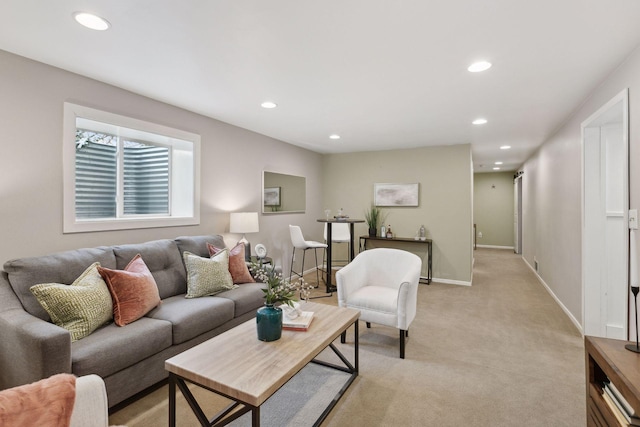 living room featuring light carpet