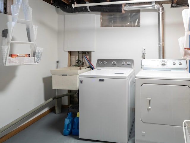 laundry room featuring independent washer and dryer