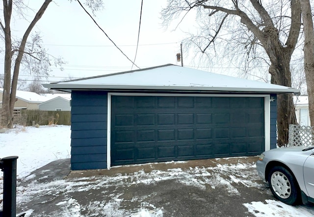 view of snow covered garage