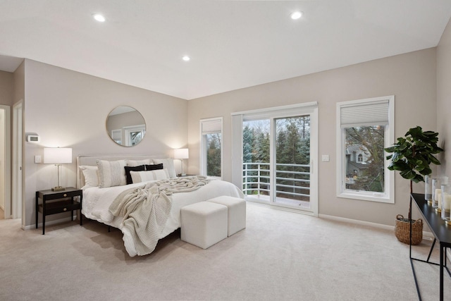 carpeted bedroom featuring access to exterior