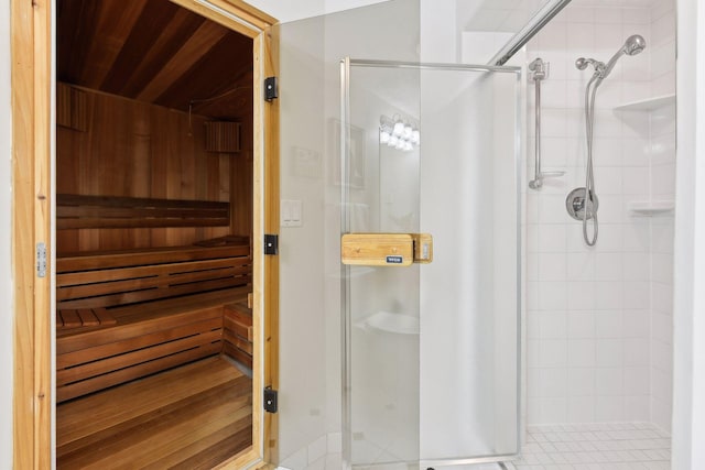 bathroom featuring an enclosed shower