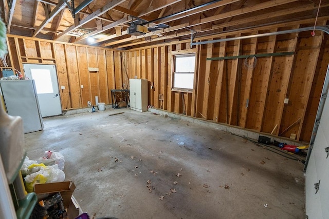 miscellaneous room featuring a healthy amount of sunlight and concrete flooring