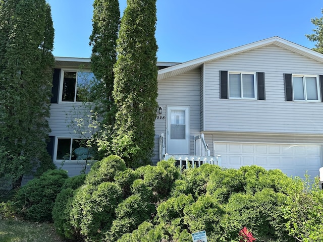 1028 241st Ave NE, East Bethel, MN 55005 - tri-level home with a garage