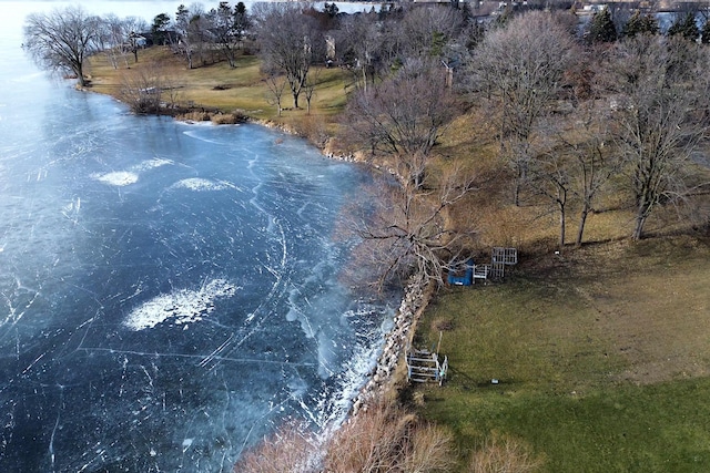 aerial view with a rural view and a water view