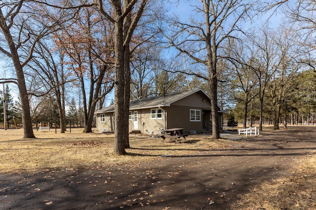 view of home's exterior with stucco siding