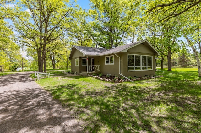 13749 County Road 116, Merrifield, MN 56465 - view of side of home featuring a lawn