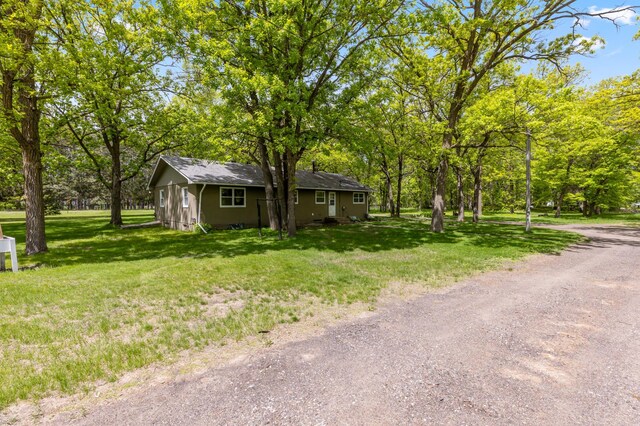 13749 County Road 116, Merrifield, MN 56465 - view of front of house with a front lawn and a shingled roof