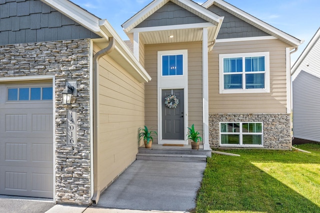 property entrance featuring a lawn