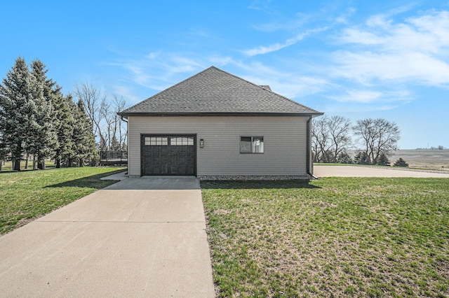 view of property exterior featuring a garage and a lawn