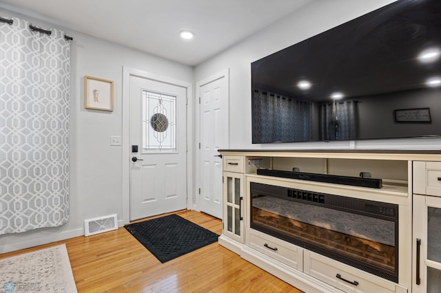 entryway with light wood-type flooring