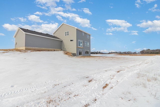 view of snow covered property