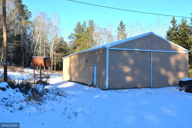 view of snow covered garage