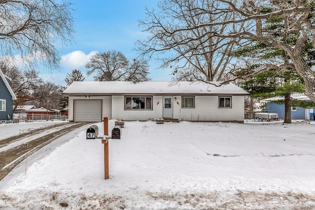 single story home featuring a garage