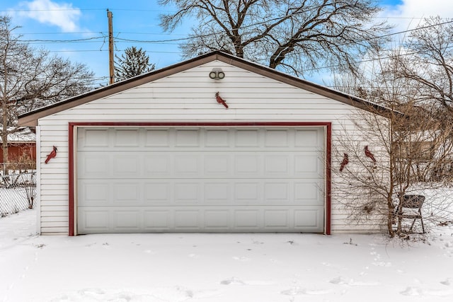 view of snow covered garage