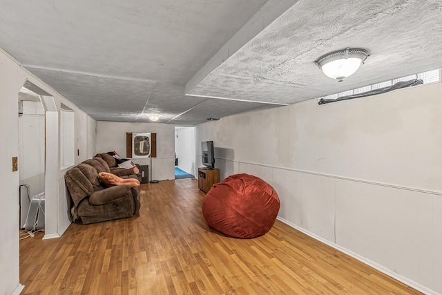 basement with light wood-type flooring