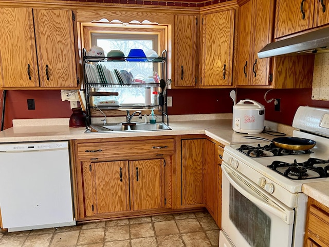 kitchen with white appliances and sink