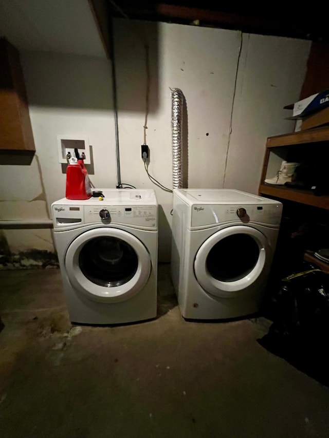 laundry room featuring washer and clothes dryer