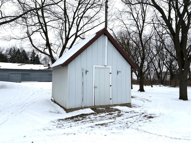5114 46th St, Merton Twp, MN 55060 - snow covered structure with a storage shed and an outbuilding