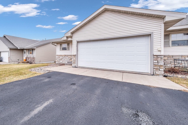 single story home with a garage